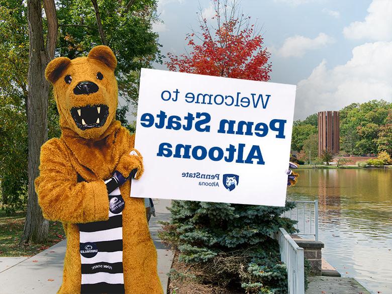 The Nittany Lion mascot holding up a sign reading Welcome to <a href='http://8seko.goudounet.com'>十大网投平台信誉排行榜</a>阿尔图纳分校